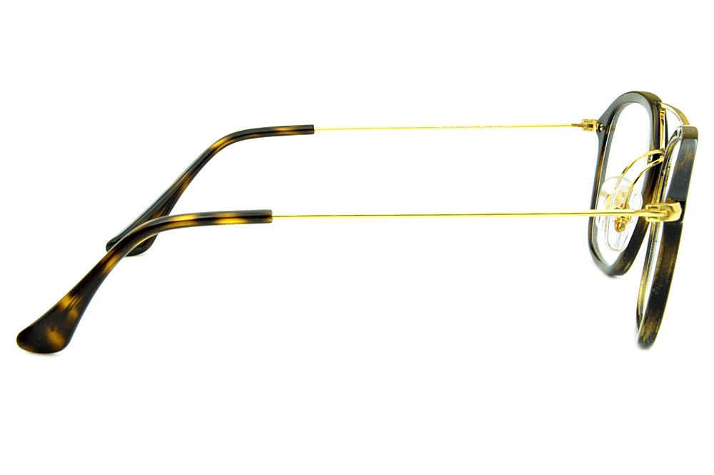 Armação de óculos de grau Ray-Ban marrom mesclado tartaruga onça ponte e haste fina metal dourado
