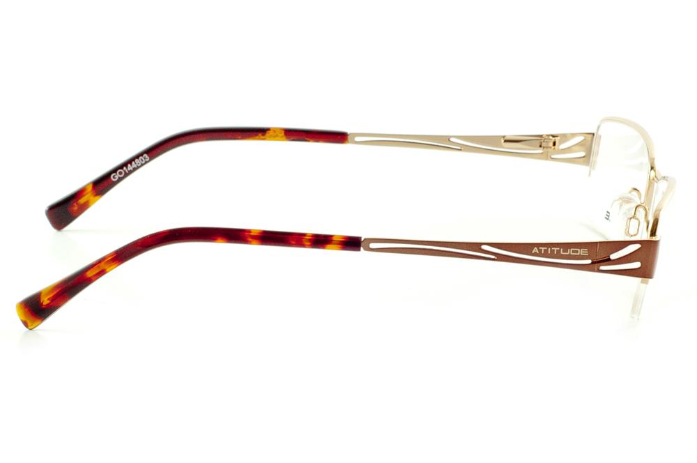 Óculos Atitude dourado com haste cobre e efeito onça com detalhe vazado flexível de mola