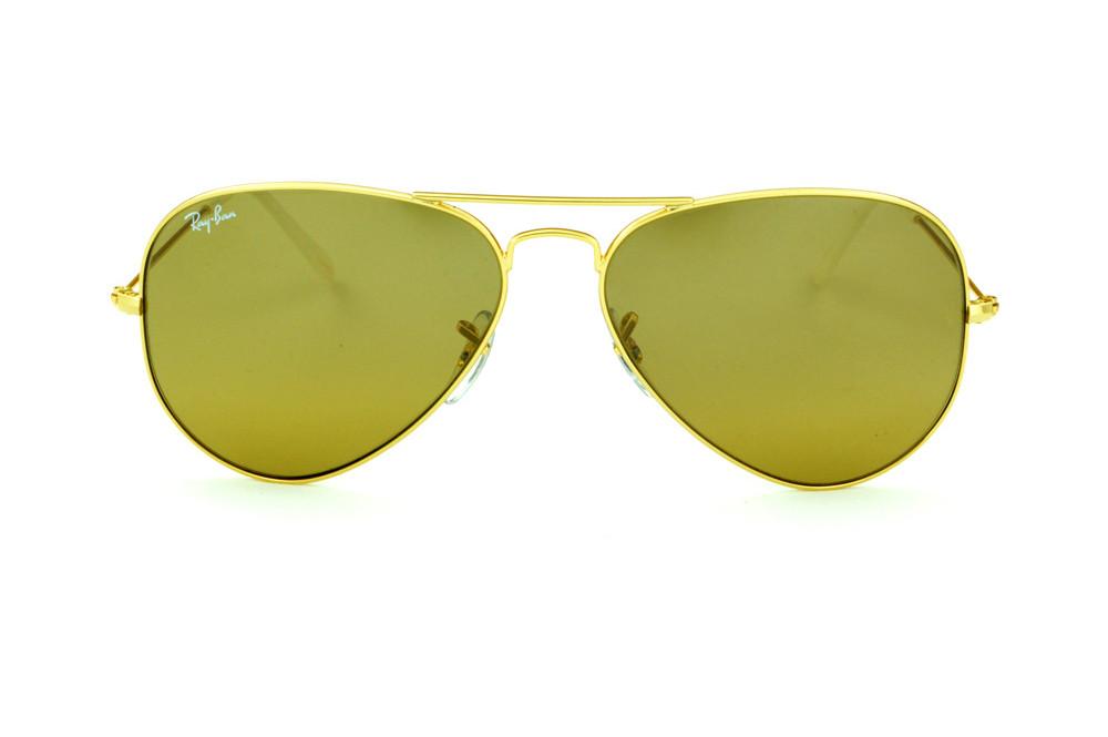 Óculos de sol Ray-Ban Aviador dourado lente marrom e ponteira branca